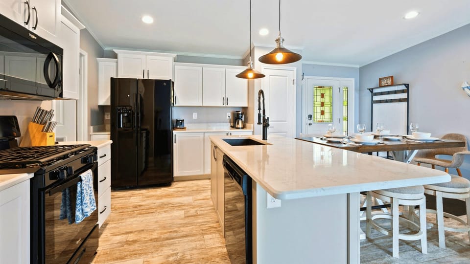 Unleash your inner chef in this stylish kitchen – where cooking dreams come to life, one dish at a time. Welcome to your culinary haven.