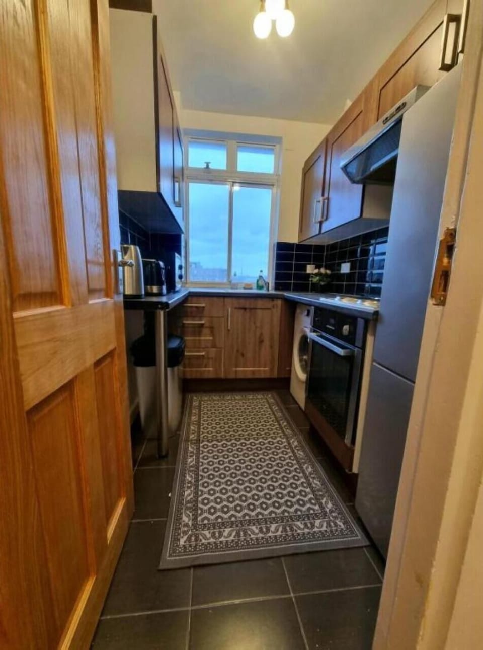 This photo represent the kitchen of the property. 