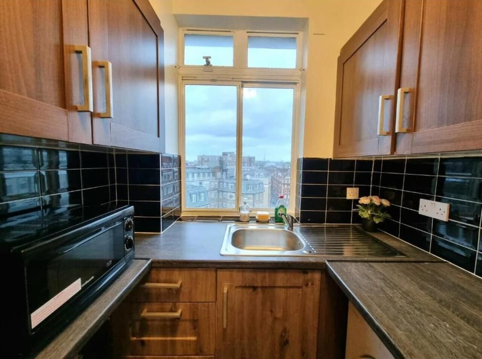 This photo represent the kitchen of the property. 