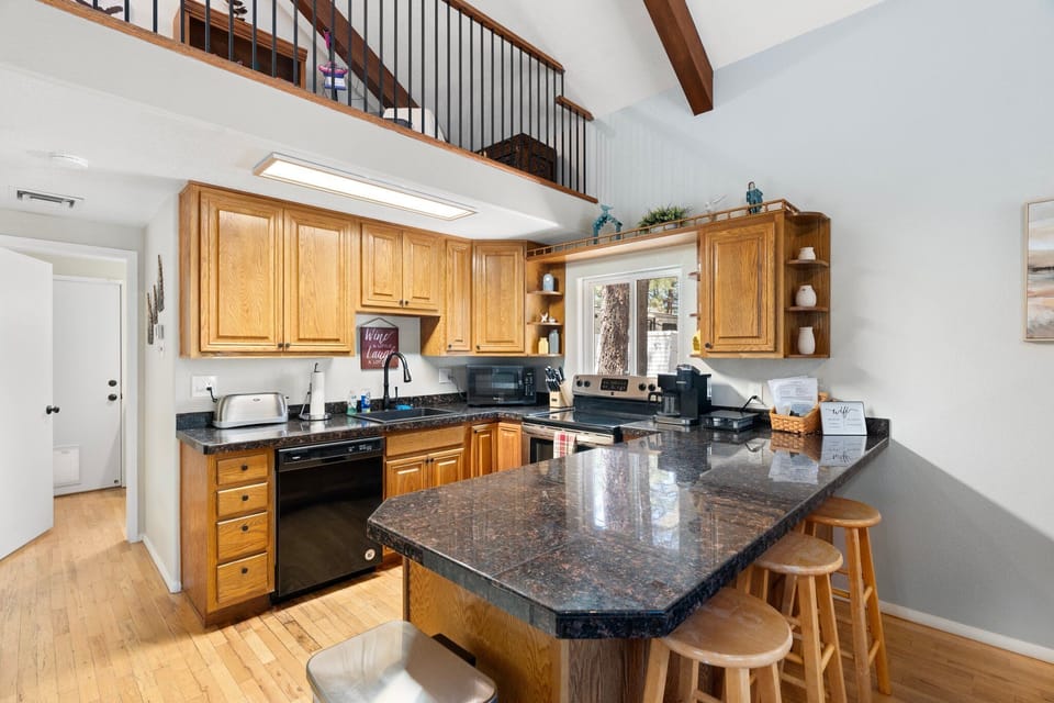 Wraparound counter provides plenty of space to spread out and cook a full meal.