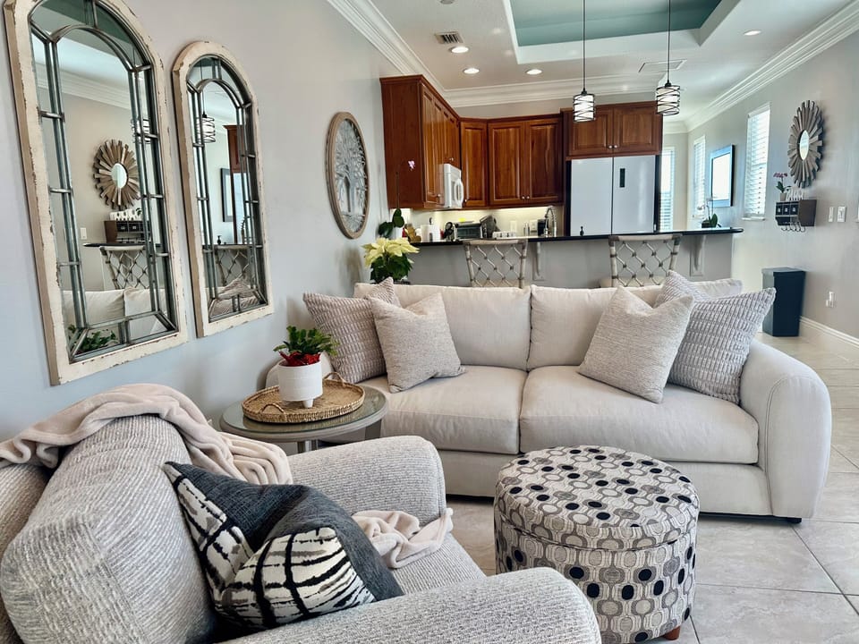 Comfy living area.  The couch minus the pillow makes in to a single bed. 