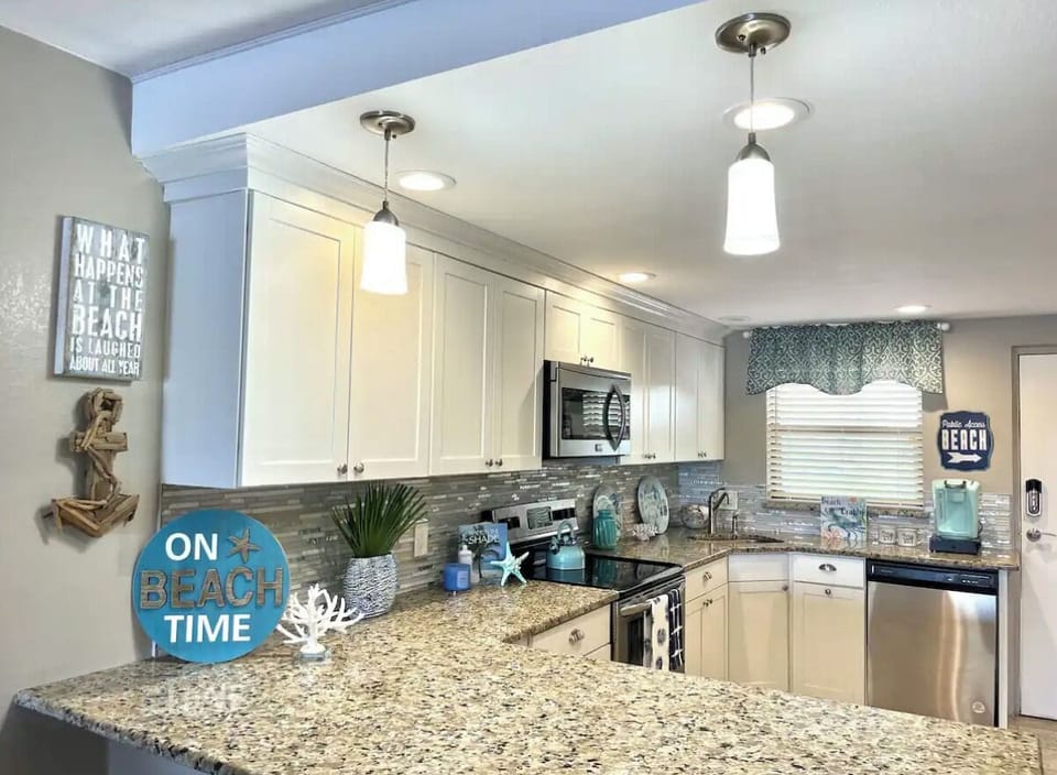 The kitchen is fully stocked with everything you need to feel right at home. 