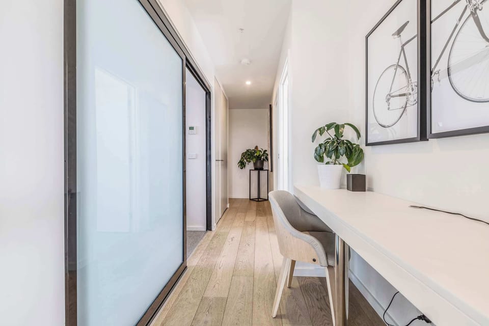 DEDICATED WORKSPACE: A quiet area with a built-in desk designed for your ultimate focus and productivity.