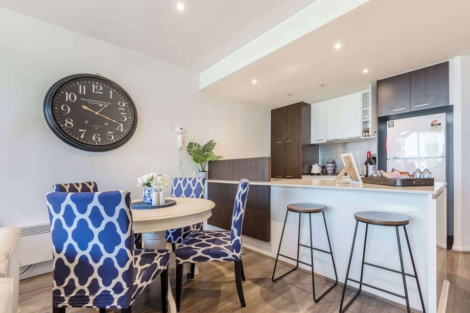 DINING AREA: A cosy space made for shared meals and easy conversation, with seating for four and just the right touch of Hamptons charm.