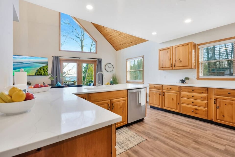 Remodeled quartz countertops with plenty of prep space. 