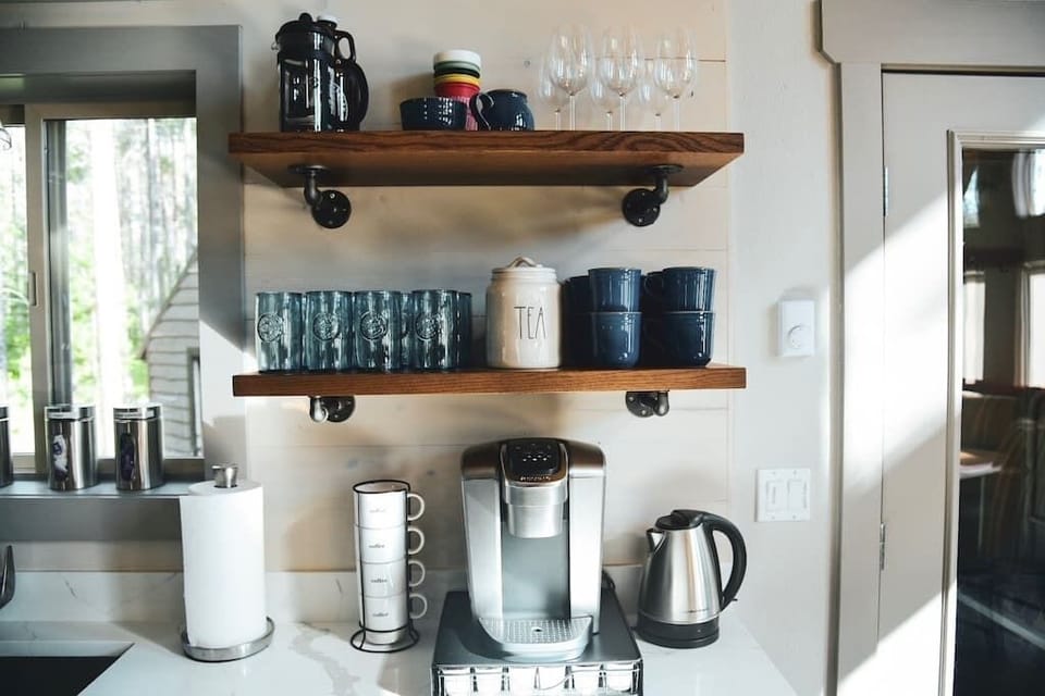 Kickstart your day with a perfect cup of coffee or tea, as all the essentials are provided!
