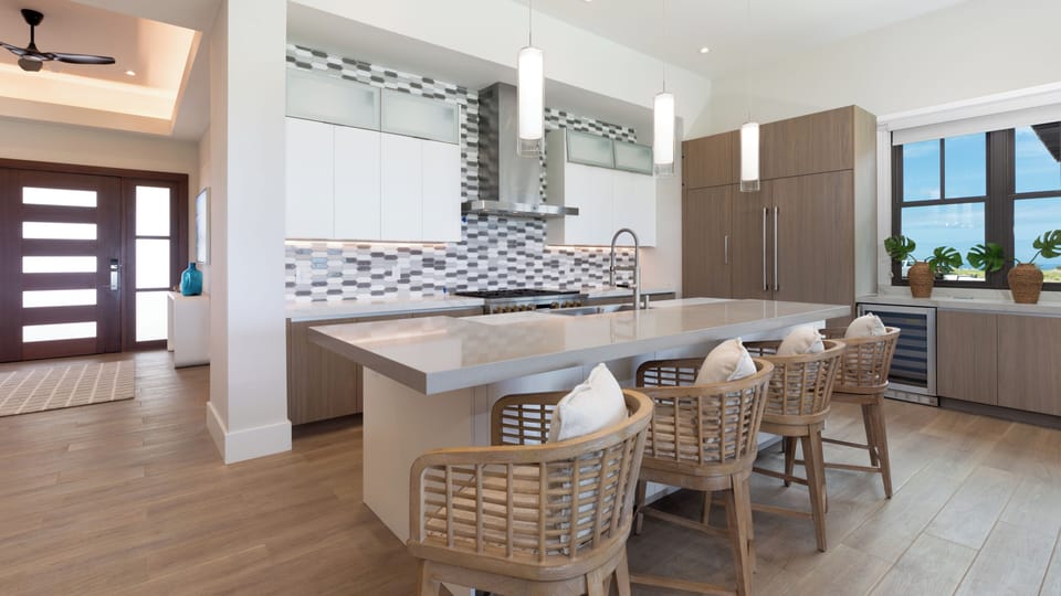 New large gourmet kitchen with 48" gas range, wine fridge, and massive island