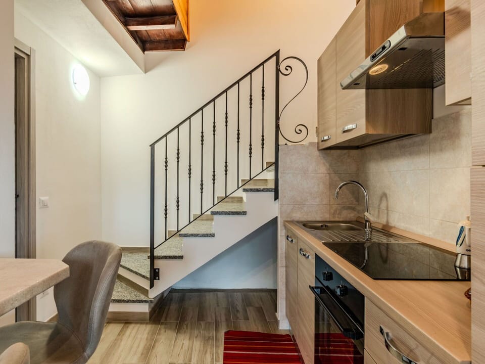 Property, Cabinetry, Wood, Countertop, Stairs, Floor, Flooring, Interior Design, Sink, Wood Stain