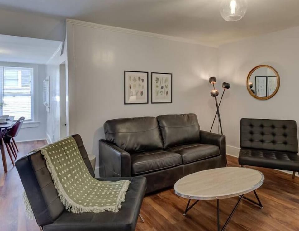 Unwind in our stylish living space where modern comfort meets elegant design. Perfect for relaxing after exploring the city or enjoying a movie night in.