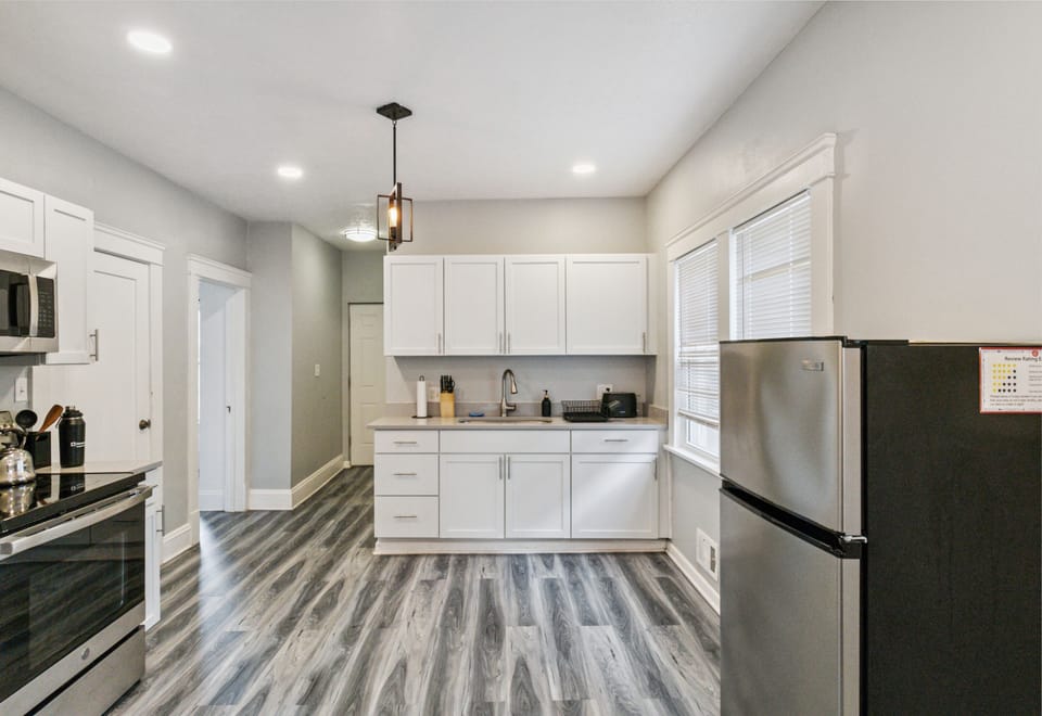 The open-concept kitchen and dining area are designed for both simplicity and connection. The fully equipped kitchen features everything you need to prepare a meal ,basic cookware, and thoughtful essentials like coffee, tea, and spices are provided.