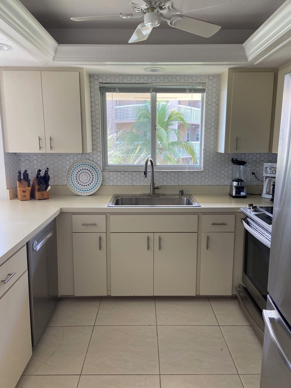 New Stainless Appliances- dishwasher, cooktop, stove/microwave and refrigerator