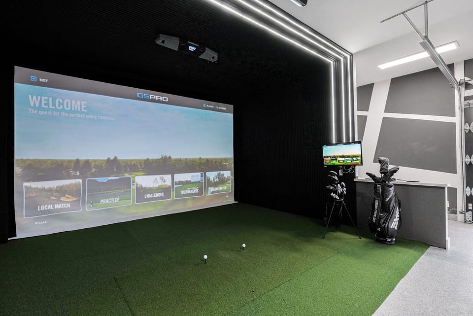 Your personal golf simulator and chill zone awaits
