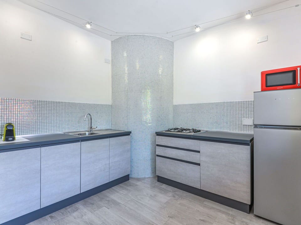 Cabinetry, Building, Wood, Interior Design, Countertop, Plumbing Fixture, House, Floor, Tap, Flooring