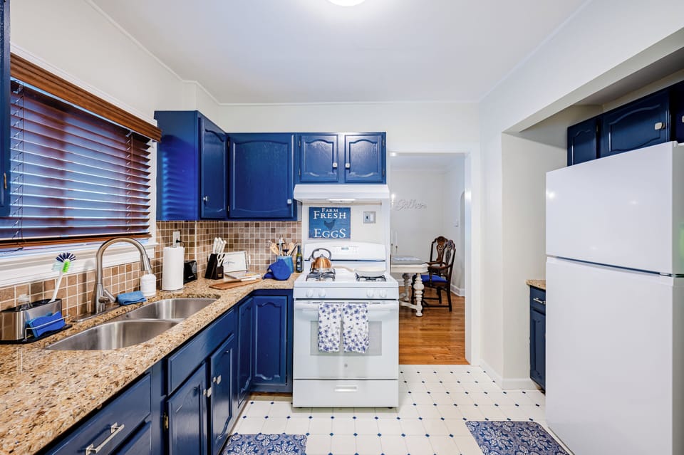 Whip up your favorite dishes in this full kitchen with plenty of supplies.