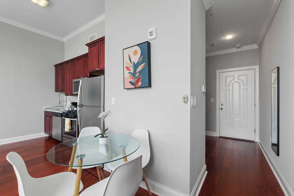 Elevated dining island with bar-height seating—perfect for meals or productive work-from-home sessions.