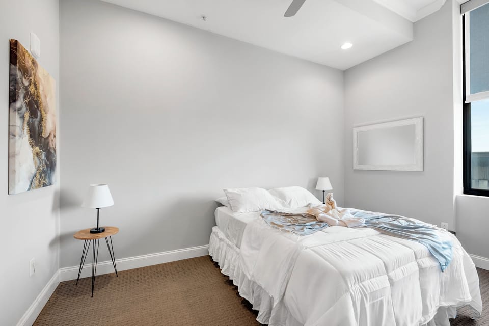  Sleeping area with quality linens and modern furnishings ensuring restful nights.