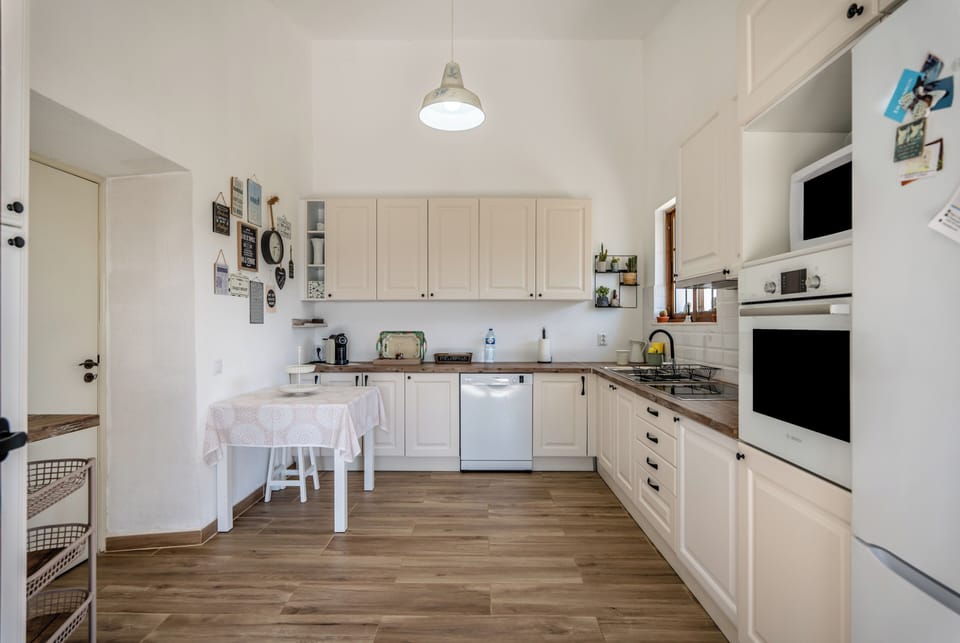 A modern kitchen with everything we think one should expect!