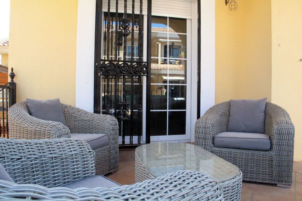 Curl up in lush chairs on the terrace