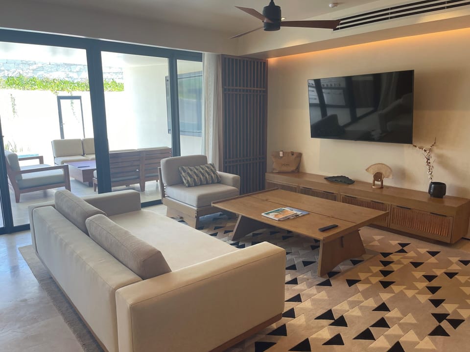 Hang out inside or by the pool.  Four large screen TV's in all.