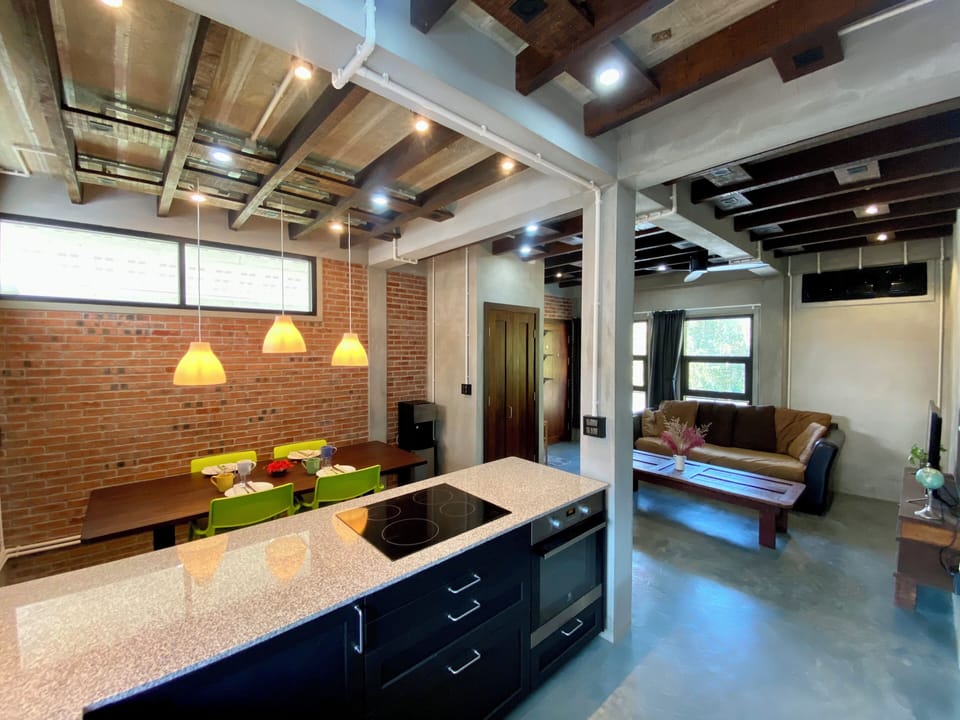 Open floor plan combines the kitchen, dining and living spaces