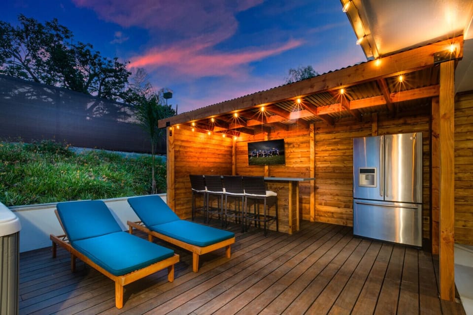 View of the outside bar and kitchen as the sun is settling down