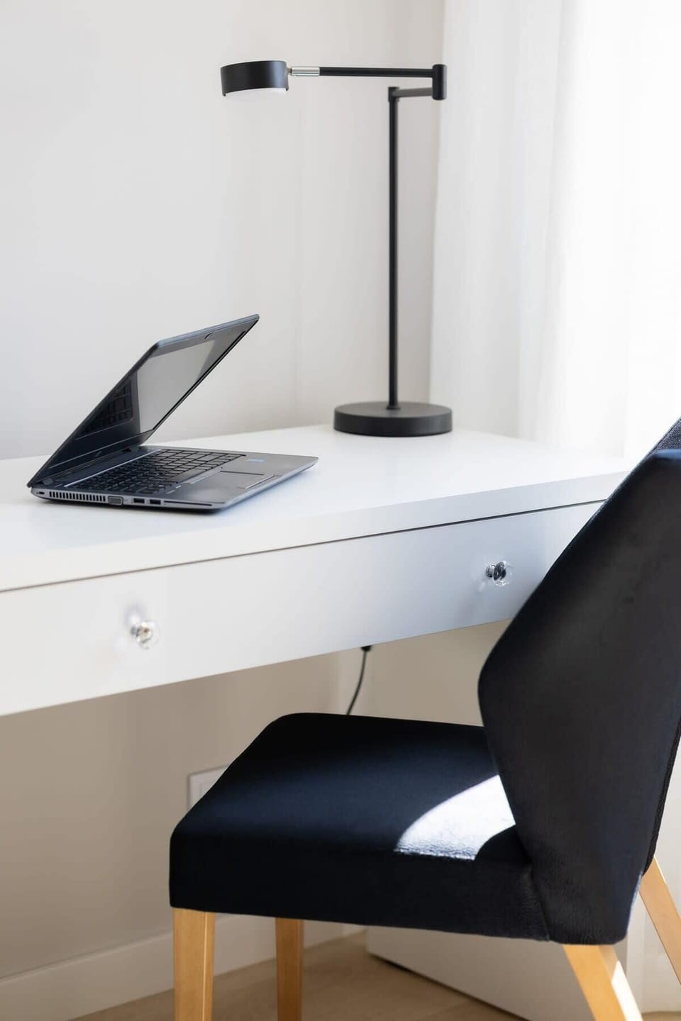 Dedicated workspace with a chair and desk — ideal for remote work.
