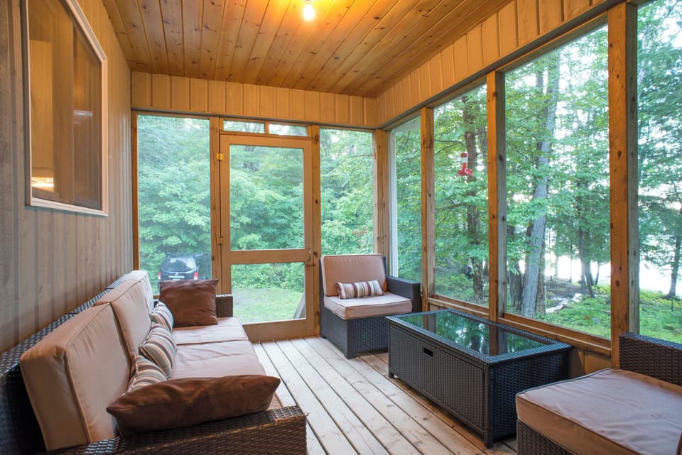 Screened Muskoka room off living area.

