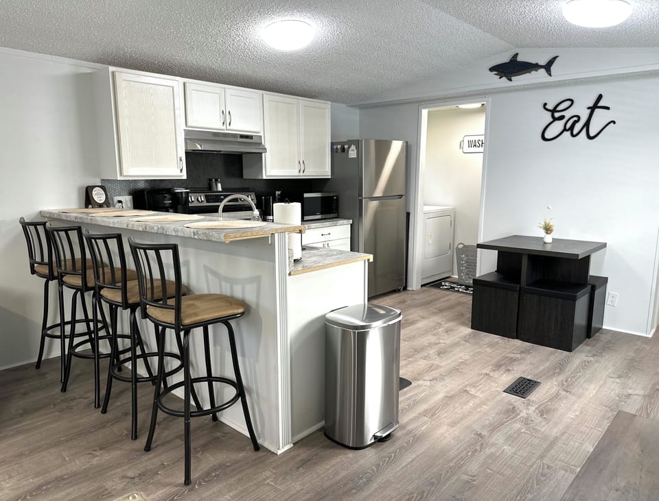Full Kitchen with dining area, and coffee station!  