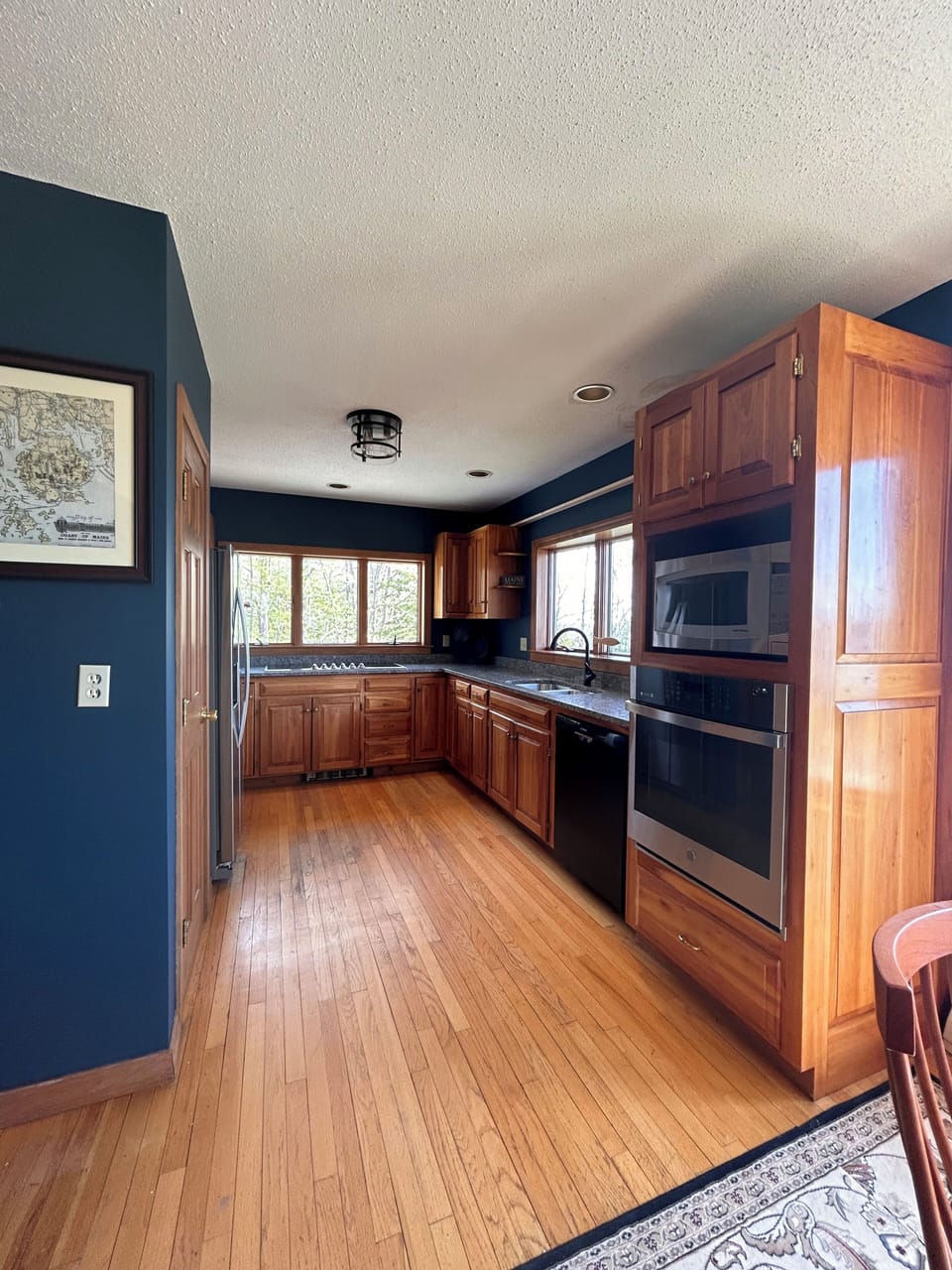 Full kitchen overlooking the ocean.