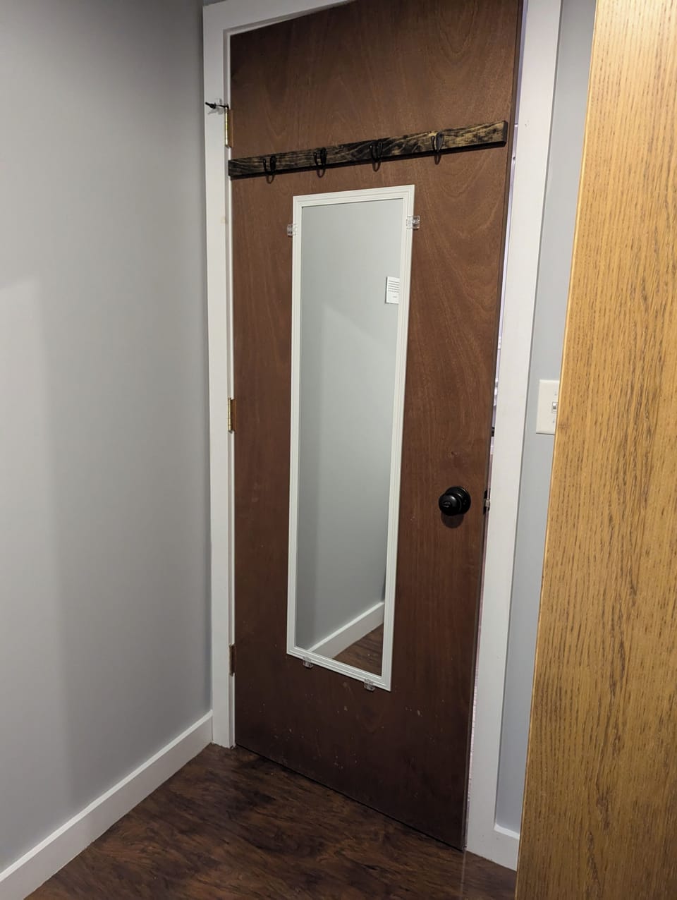 And a full length mirror is on the back of the entry door of the second bedroom.