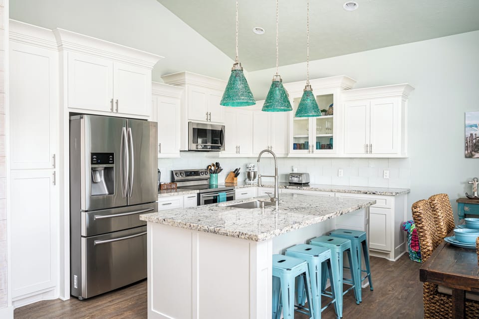 This kitchen has it all! Seating for 4 at the island and 6 at the table.