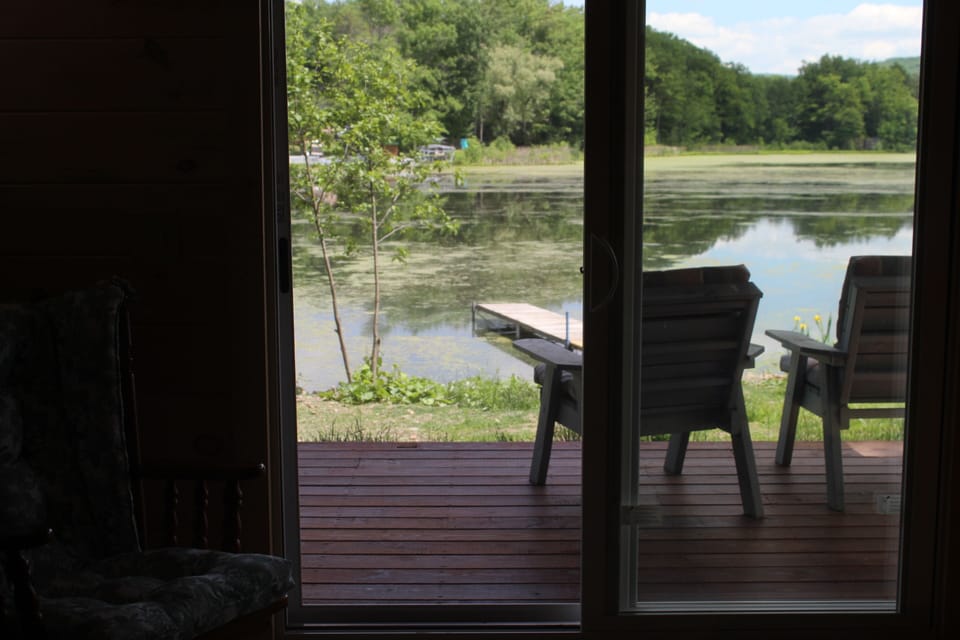 Beautiful sliding glass doors with screen and lake view/access.