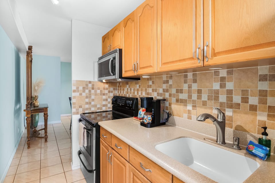 Fully equipped kitchen with full-size appliances.