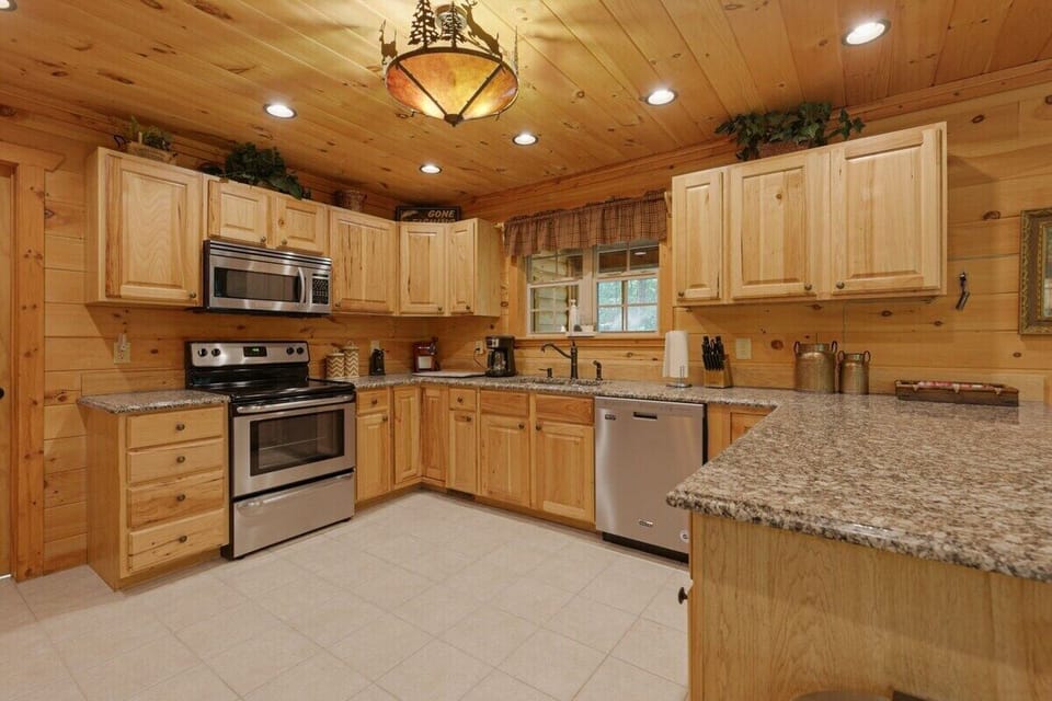 Gorgeous remodeled kitchen with granit counters and stainless steel appliances
