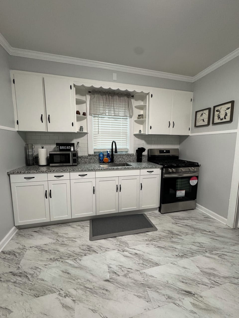 Beautiful kitchen, coffee maker, toaster, pots & pans, microwave new appliances