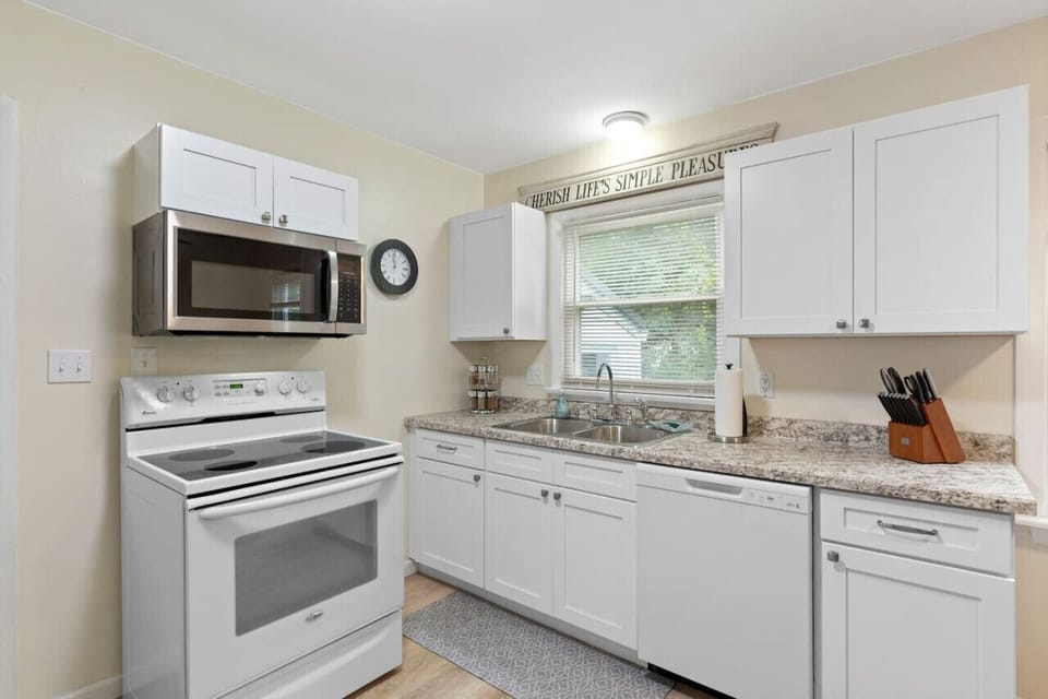 Brightly lit kitchen fully equipped for your stay!