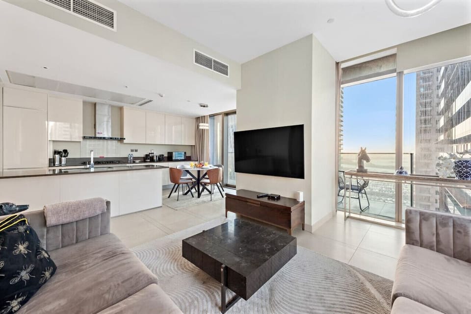 Living Room: Bright and airy space with stunning views, perfect for relaxation and gatherings!