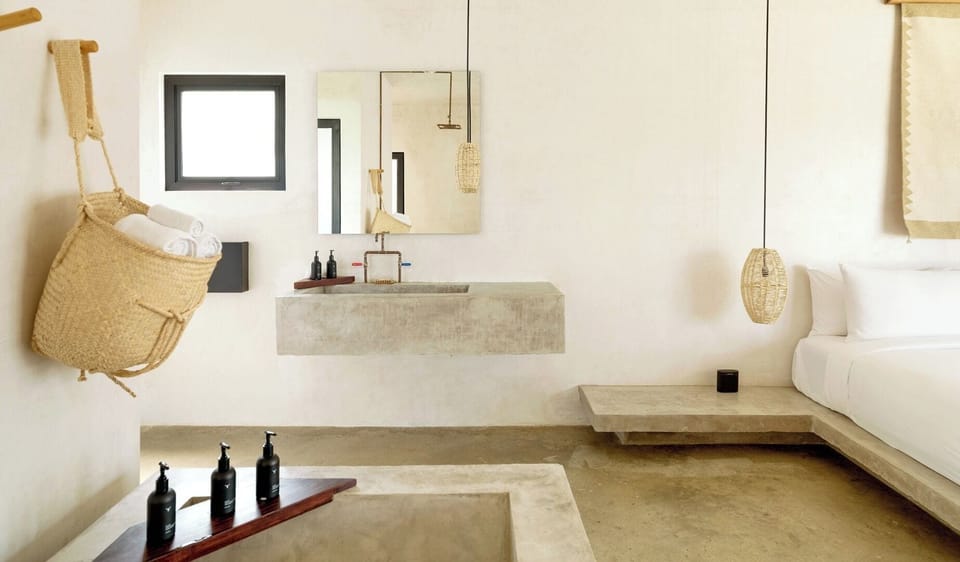 Unwind in a serene suite with spa-style soaking tub.