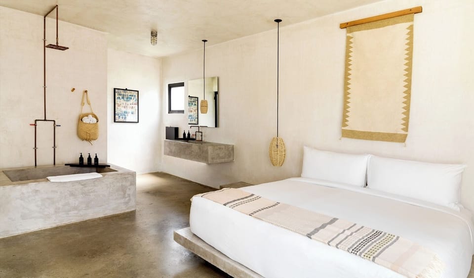 Indulge in a spa-like soak in minimalist open-plan luxury.