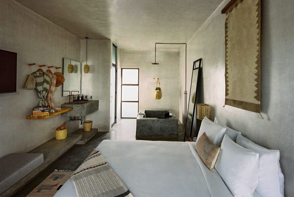 Unwind in minimalist calm with spa tub steps away.