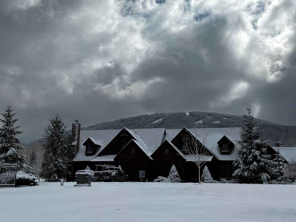 Front of home with Timberline Mountain Ski Resort behind. 