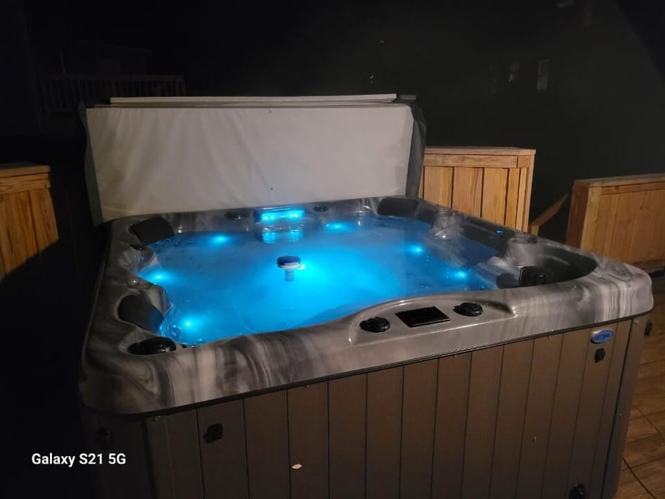 Our brand new 6-person hot tub with lounger seat - perfect for star-gazing 