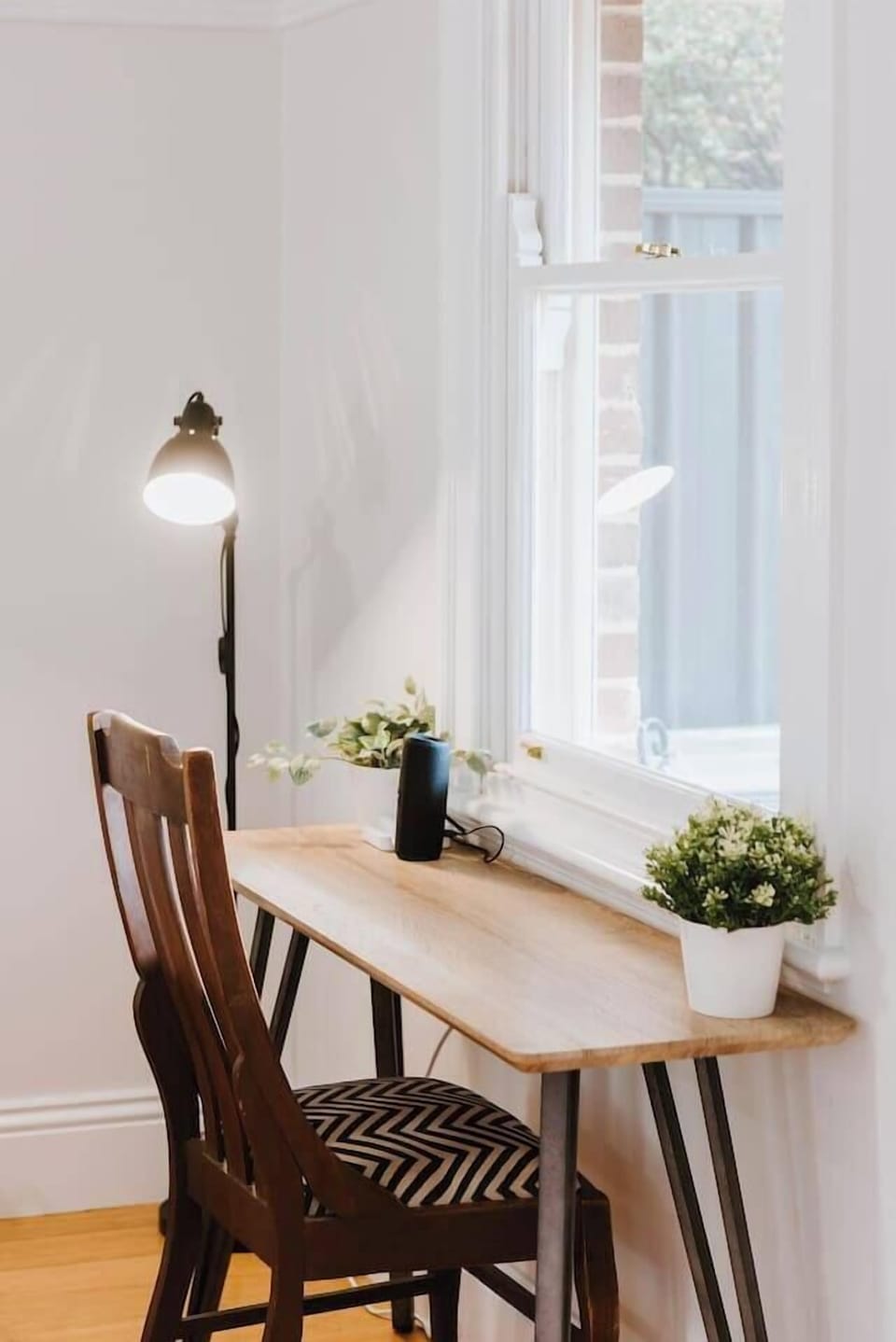 Stay productive and inspired in the designated workspace nestled within the living area of the first cottage—Kareela.