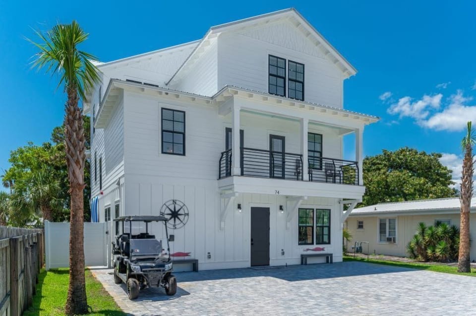 Flamingo! Sleeps 24 and less than 500 ft. from beautiful sugar sand beaches!