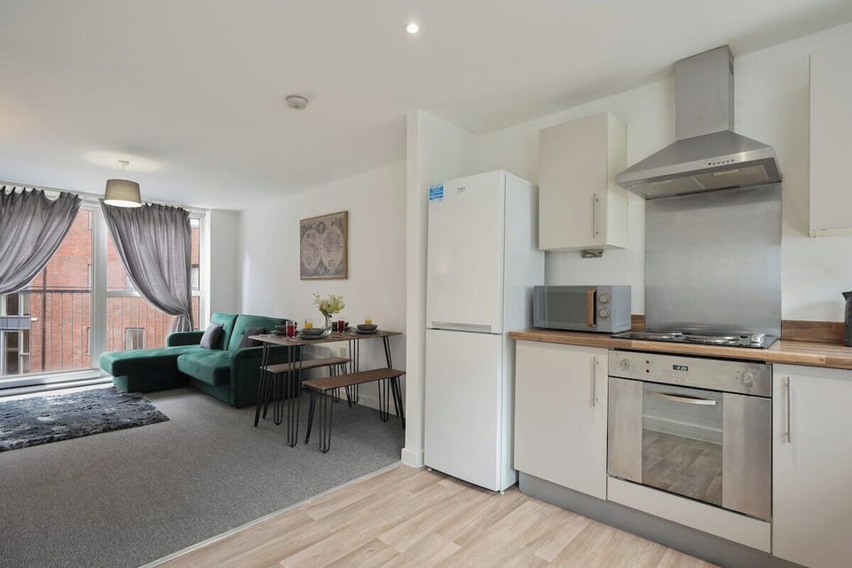 Open-plan kitchen and living area for easy socializing.