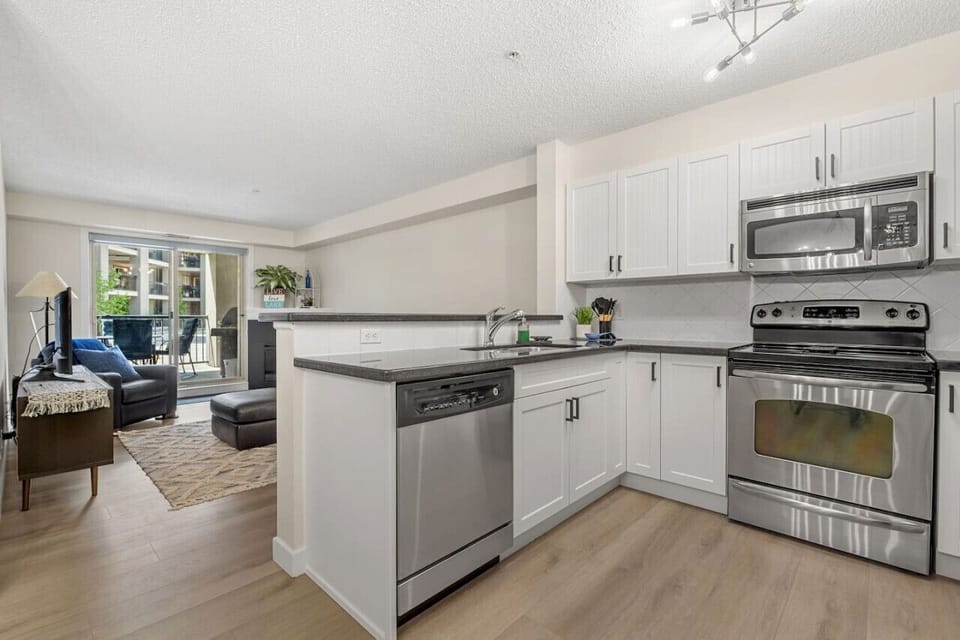 Full kitchen with a blender, crockpot, drip coffee maker, Keurig, waffle maker, electric frying pan & kettle