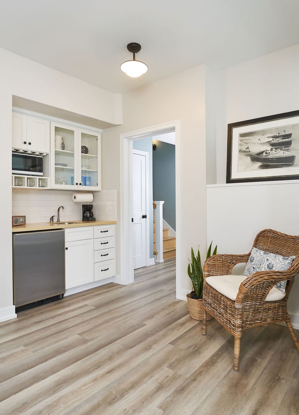 First level kitchenette with mini fridge and sink