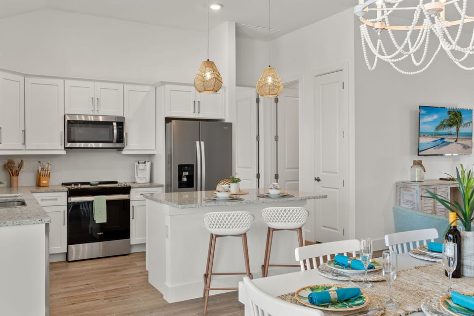 The kitchen has stainless steel appliances
