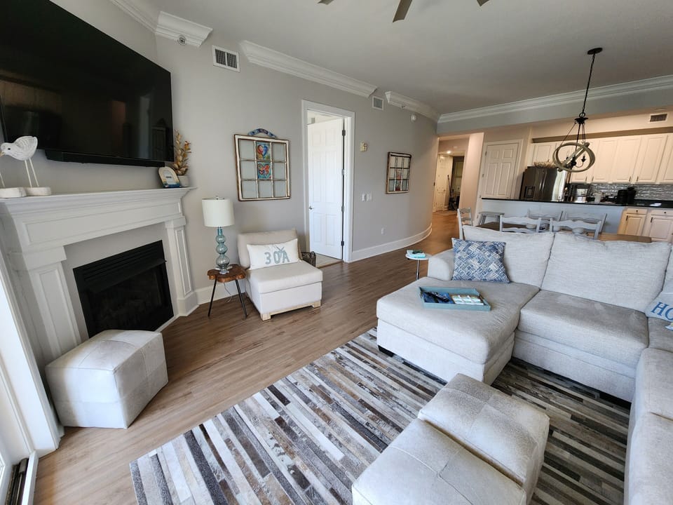 65" Smart TV and fireplace, dining table with seating for 6 and 3 barstools
