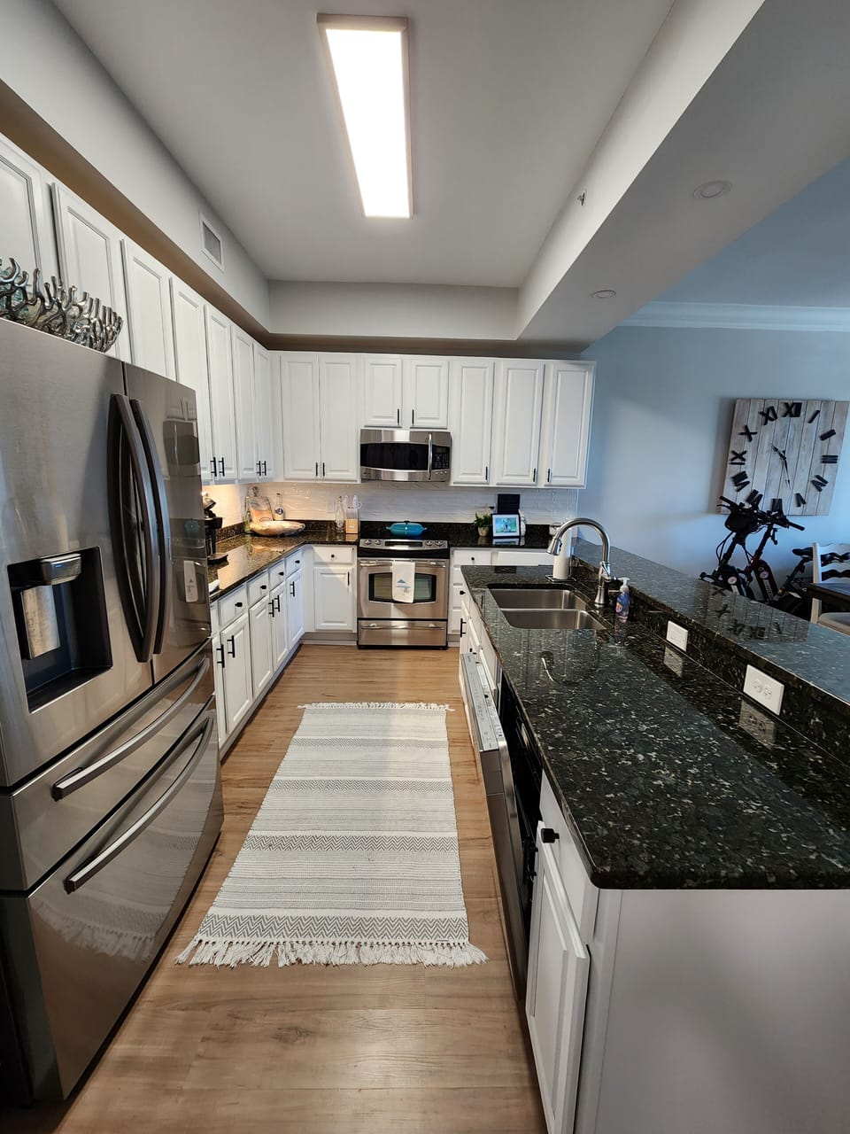 kitchen with new refrigerator, and dishwasher
